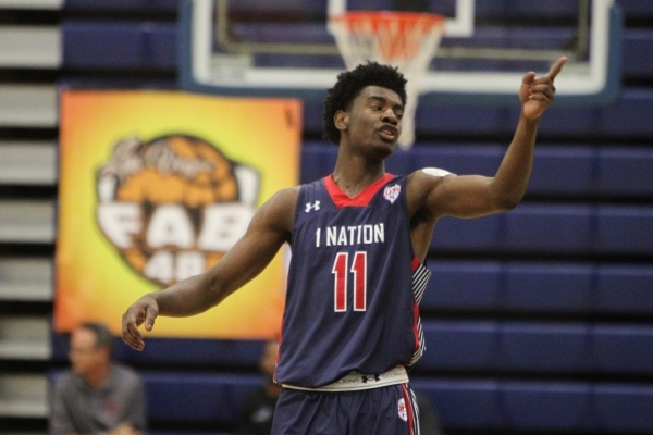 1Nation‘s Josh Jackson (11) gestures to his team in the U17 Las Vegas Fab 48 title gam ...