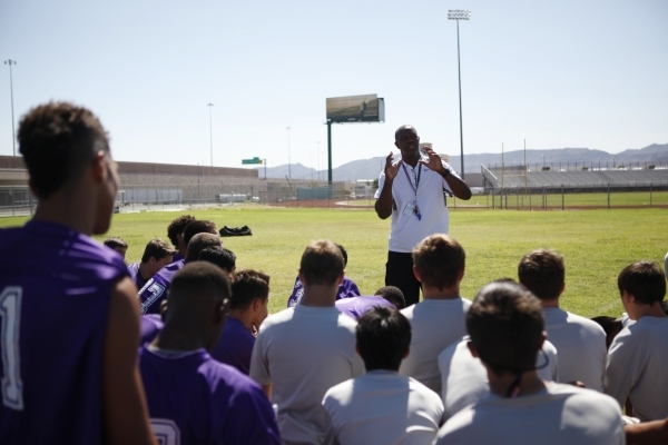 Randall Cunningham speaks to his players during practice Monday at Silverado High School. &q ...