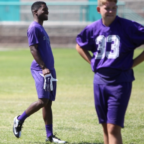 Silverado‘s Vernon Jackson, left, walks the field during practice at Silverado High Sc ...