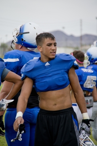 Basic High School quarterback Tank McAllister stands on the sidelines during practice at Don ...