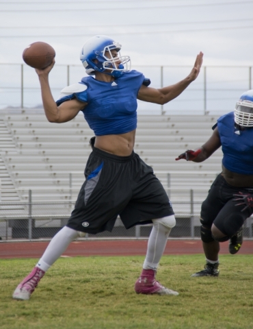 Basic High School quarterback Aeneas "Tank" McAllister prepares throws during prac ...