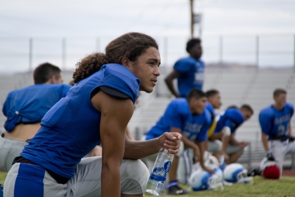 Basic High School defensive back Brian Evans watches his teammates during practice at Don Ta ...
