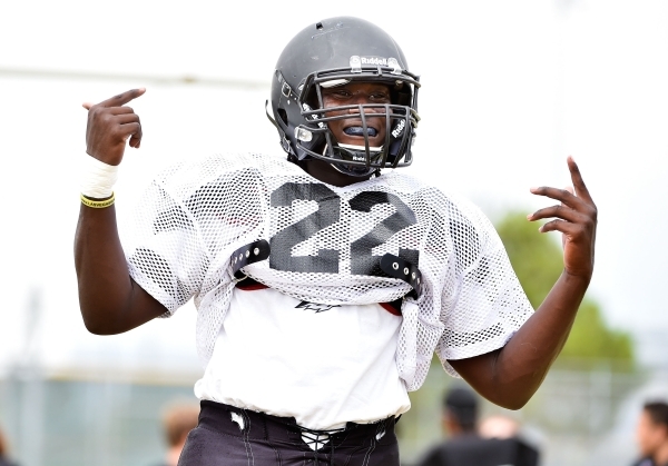 Palo Verde fullback and linebacker Chauntez Thomas gestures to teammates during football pra ...