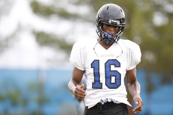 Desert Pines Randal Grimes (16) looks down after a sprint during football practice at Desert ...