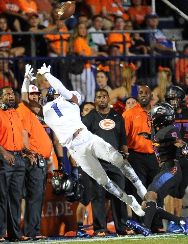 Chandler wide receiver N‘keal Harry (1) catches a pass as Bishop Gorman defensive back ...