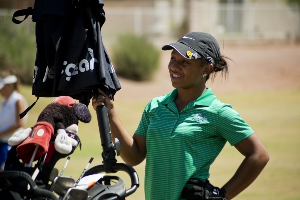 Aubrianna Jordan, a member of the Rancho High School golf team, waits between shots at The L ...