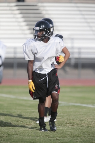 Las Vegas High School running back Elijah Hicks runs a drill during football practice at the ...