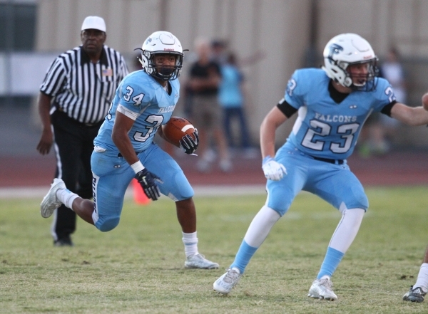 Foothill‘s Justice Jackson (34) runs the ball against Silverado during a football game ...