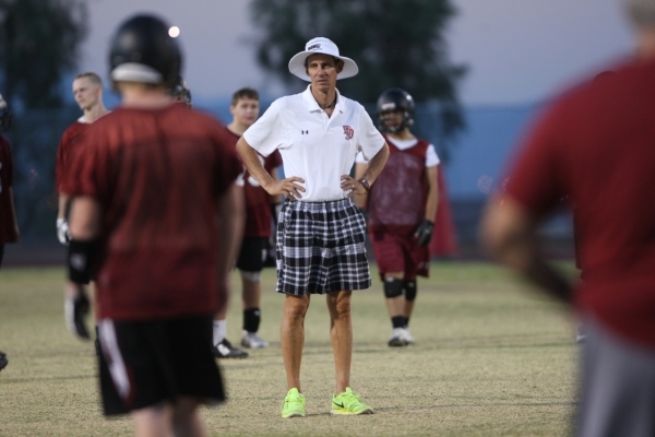 Coach Brad Talich oversees football practice at Desert Oasis High School in Las Vegas on Wed ...