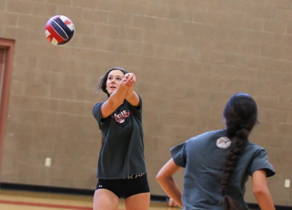 Arbor View middle blocker Kasey Kershaw returns the ball during volleyball practice in Las V ...