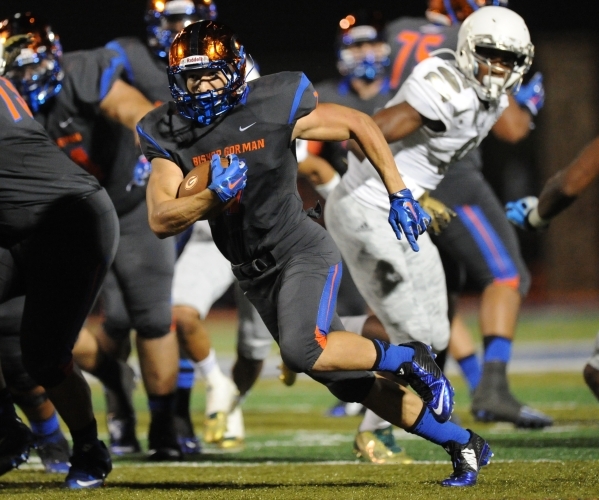 Bishop Gorman running back Biaggio Walsh (7) is seen before the start of their prep football ...
