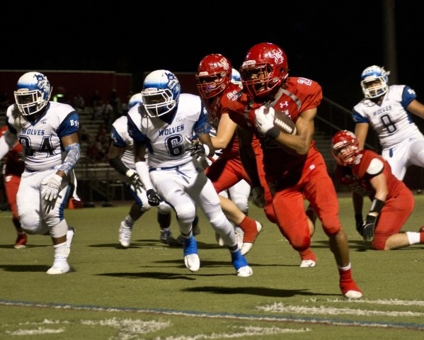 Arbor View High School running back Curtis Jones takes the ball downfield for a touchdown ag ...