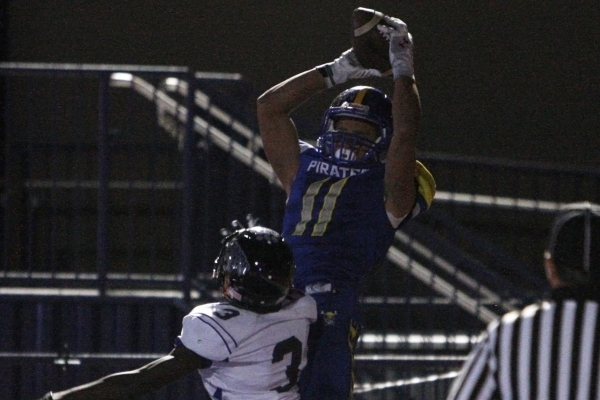 Moapa Valley wide receiver R.J. Hubert pulls in the game winning touchdown while being cover ...
