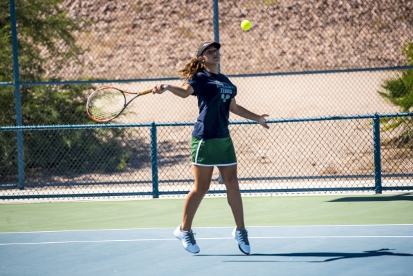 Dasha Shalina of Green Valley High School hits a forehand against Kaitlyn Picarillo of Liber ...