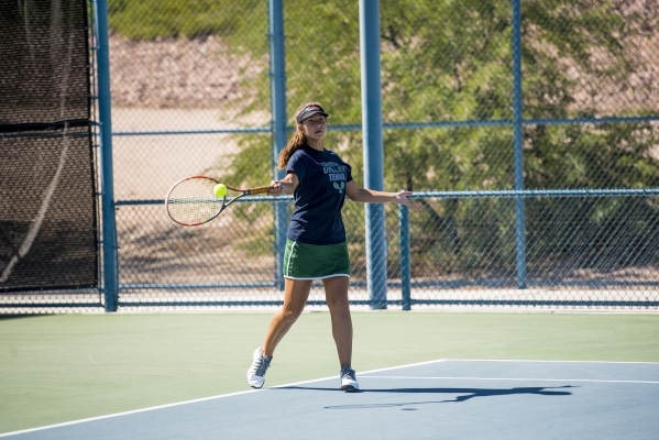 Dasha Shalina of Green Valley High School hits a forehand against Kaitlyn Picarillo of Liber ...