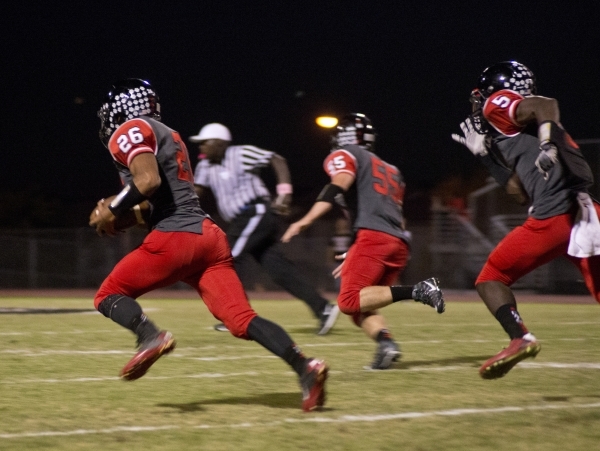 Las Vegas&lsquo; Josh Perez (26) returns a Coronado fumble for a touchdown at Las Vegas High ...