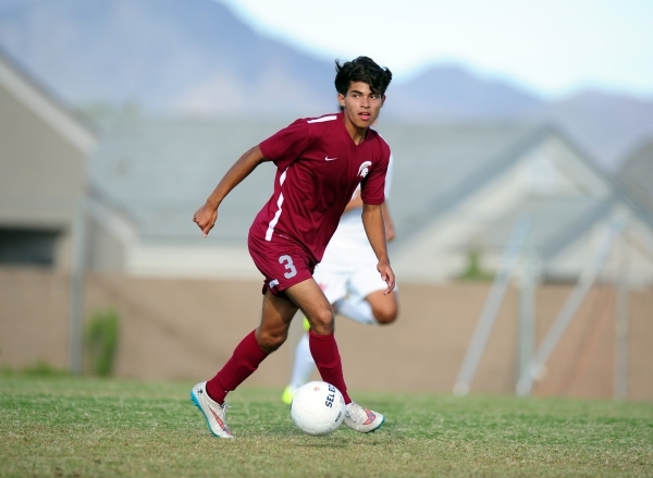 Cimarron-Memorial forward Arturo Behena dribbles the ball upfield in the second half of thei ...