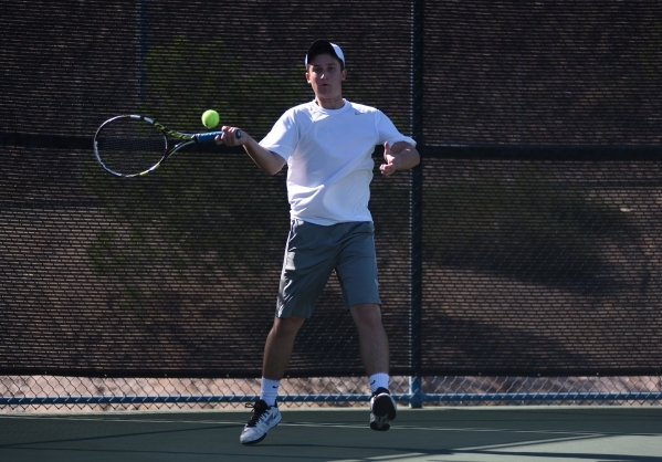 Brandon Sulzberg, 16, of Palo Verde High School hits the ball during the Sunset region tourn ...