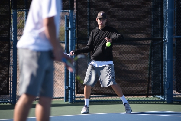 Mike Safbom, 14, of Palo Verde High School hits the ball during the Sunset region tournament ...