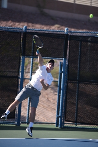 Brandon Sulzberg, 16, of Palo Verde High School hits the ball during the Sunset region tourn ...