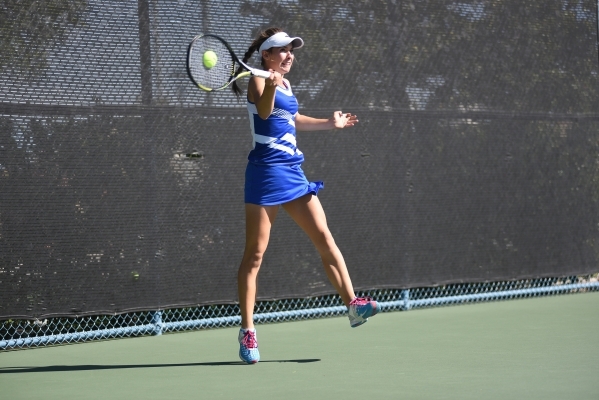 Angelique Friedrich, 14, of Bishop Gorman High School hits the ball during the Sunset region ...