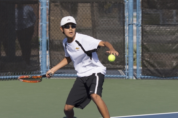 Justin Ong of Ed W. Clark High School plays against South Tahoe High School during the Divis ...