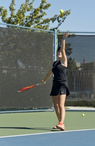 Chloe Henderson of Palo Verde High School serves during the Nevada state championship tennis ...