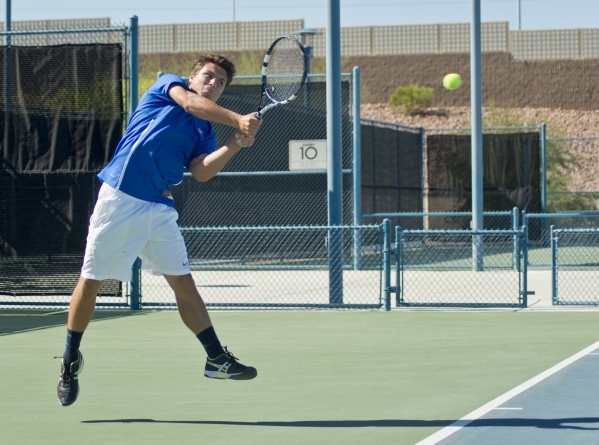 Sam Sholeff of Bishop Gorman High School hits the ball during the Nevada state championship ...