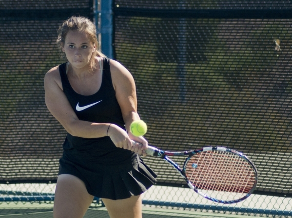 Kristen Newell of Palo Verde High School hits the ball during the Nevada state championship ...