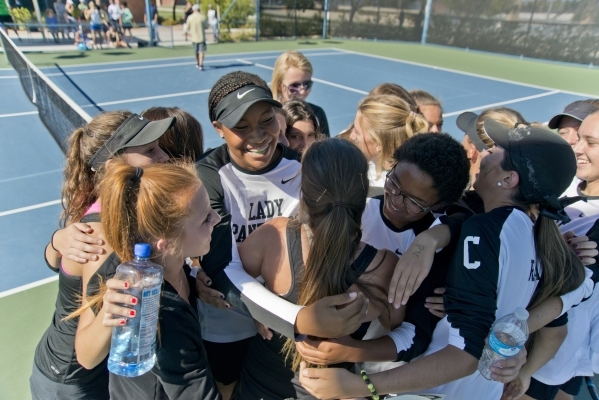 The Palo Verde High School girls congratulate Kristen Newell on her win during the Nevada st ...