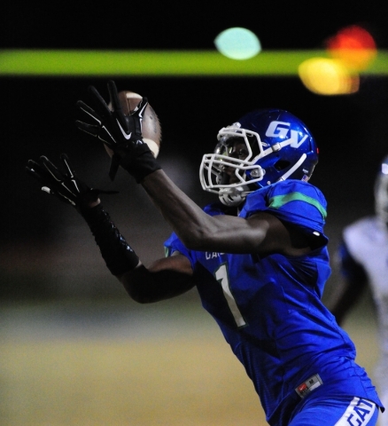 Green Valley Gators wide receiver Marquez Powell catches a pass for a first down late in the ...