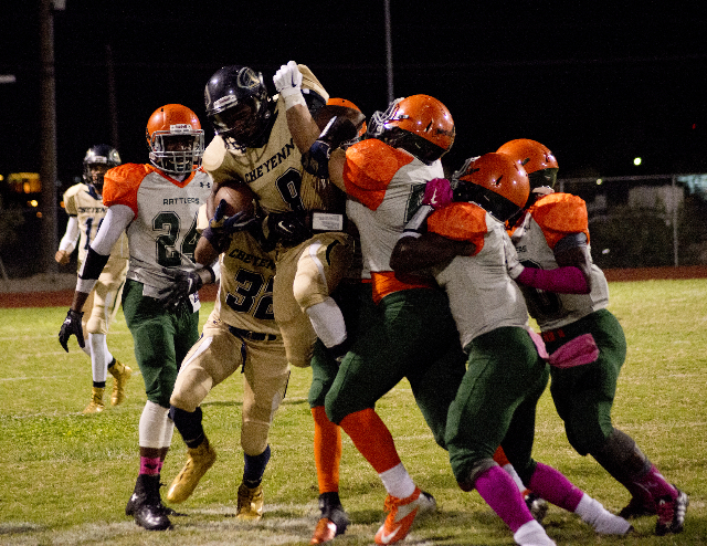 Cheyenne&lsquo;s Cameron Myles (8) is lifted out of bounds after a run during their prep foo ...