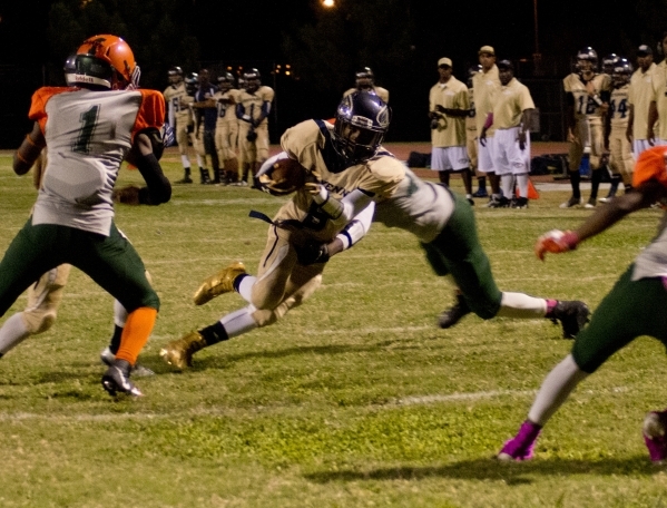 Cheyenne&lsquo;s Deriontae Green (5) runs the ball into the end zone during their prep footb ...