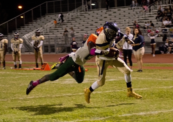 Cheyenne&lsquo;s Deriontae Green (5) runs the ball into the end zone during their prep footb ...