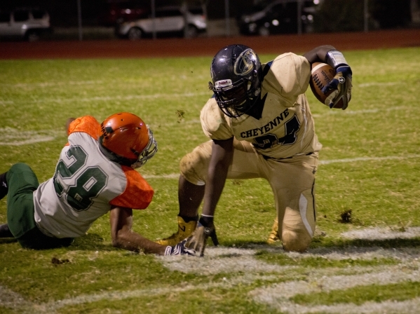 Mojave&lsquo;s David Walker (34) comes to a stop after running the ball downfield during the ...