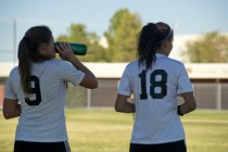 Clark High School girls soccer players Darian Gambetta (9) and Ariana Reyes (18) take a brea ...