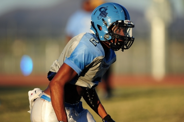 Canyon Springs running back Christian Minor lines up at the line of scrimmage during footbal ...