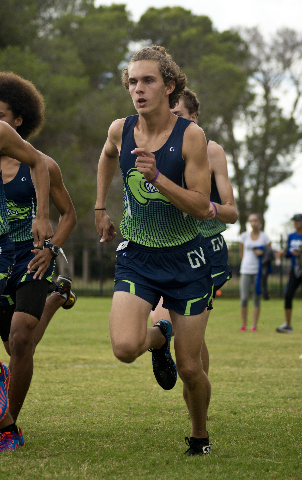 Austin Rogers, of Green Valley High School, begins his race during the Cross Country Divisio ...