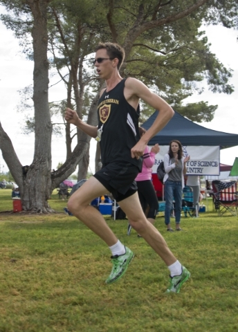 Chase Wood, of Faith Lutheran High School, leads his race during the Cross Country Division ...