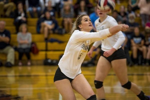 Hayley Huntsman of Bonanza puts the ball up into play during a volleyball match against Cent ...