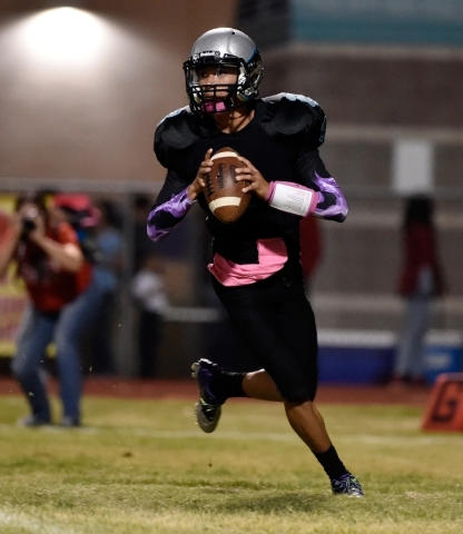 Silverado quarterback Christian Baltodano looks to pass against Liberty during the first hal ...
