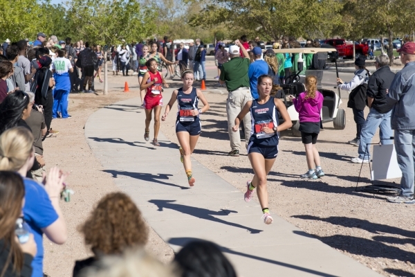 Runners compete during the girls Division I Sunrise cross country regional finals at Veteran ...