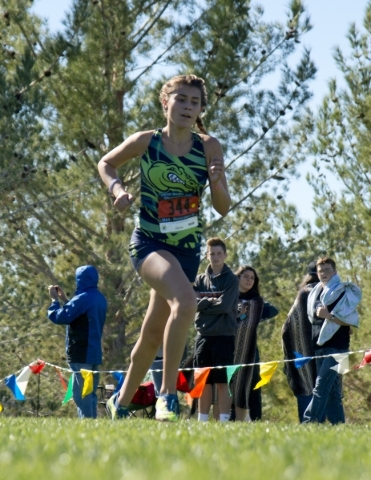 Mia Smith of Green Valley High School finishes first during the girls Division I Sunrise cro ...
