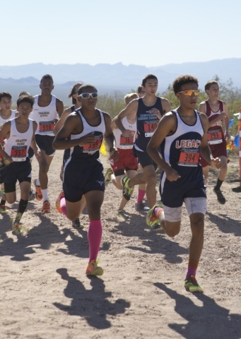 Runners compete during the boys Division I Sunset cross country regional finals at Veterans ...