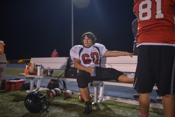 Mountain View Christian High School football player David Stanik sits on the sidelines after ...
