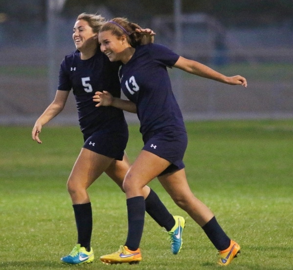 Shadow RidgeÃ­s Danika Shupe, left, joins Taylore Simmons to celebrate after Simmons score ...