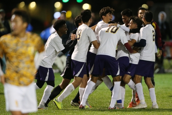 Durango players celebrate their golden goal to win the game 4-3 in extra time against Bonanz ...