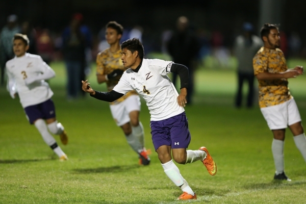 Durango‘s Marcos Delangel-Parra (4) reacts after scoring a goal against Bonanza in the ...