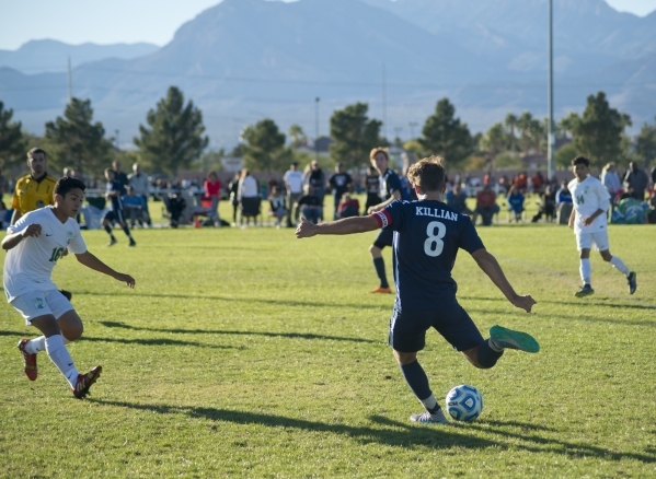 Coronado‘s Nick Killian (8) kicks the ball during the Sunrise Region boys soccer champ ...