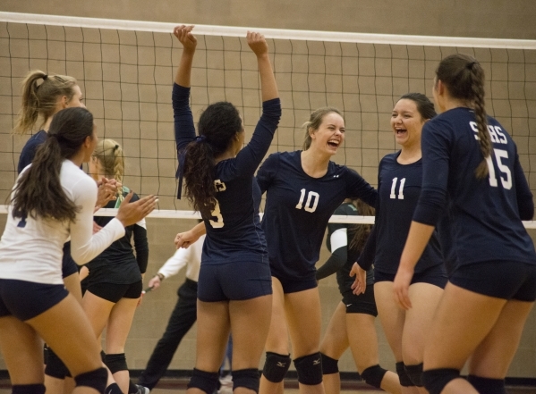 Shadow Ridge celebrates a point during the Sunset Region girls volleyball semifinal against ...